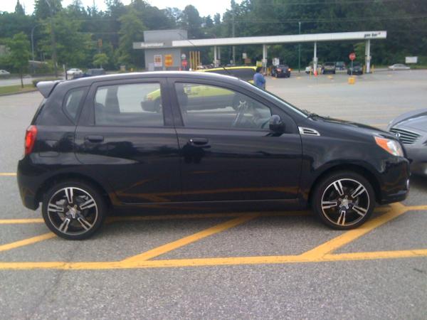 2011 Chevrolet Aveo LT i think... its not the fully loaded versio: wheelsandtires